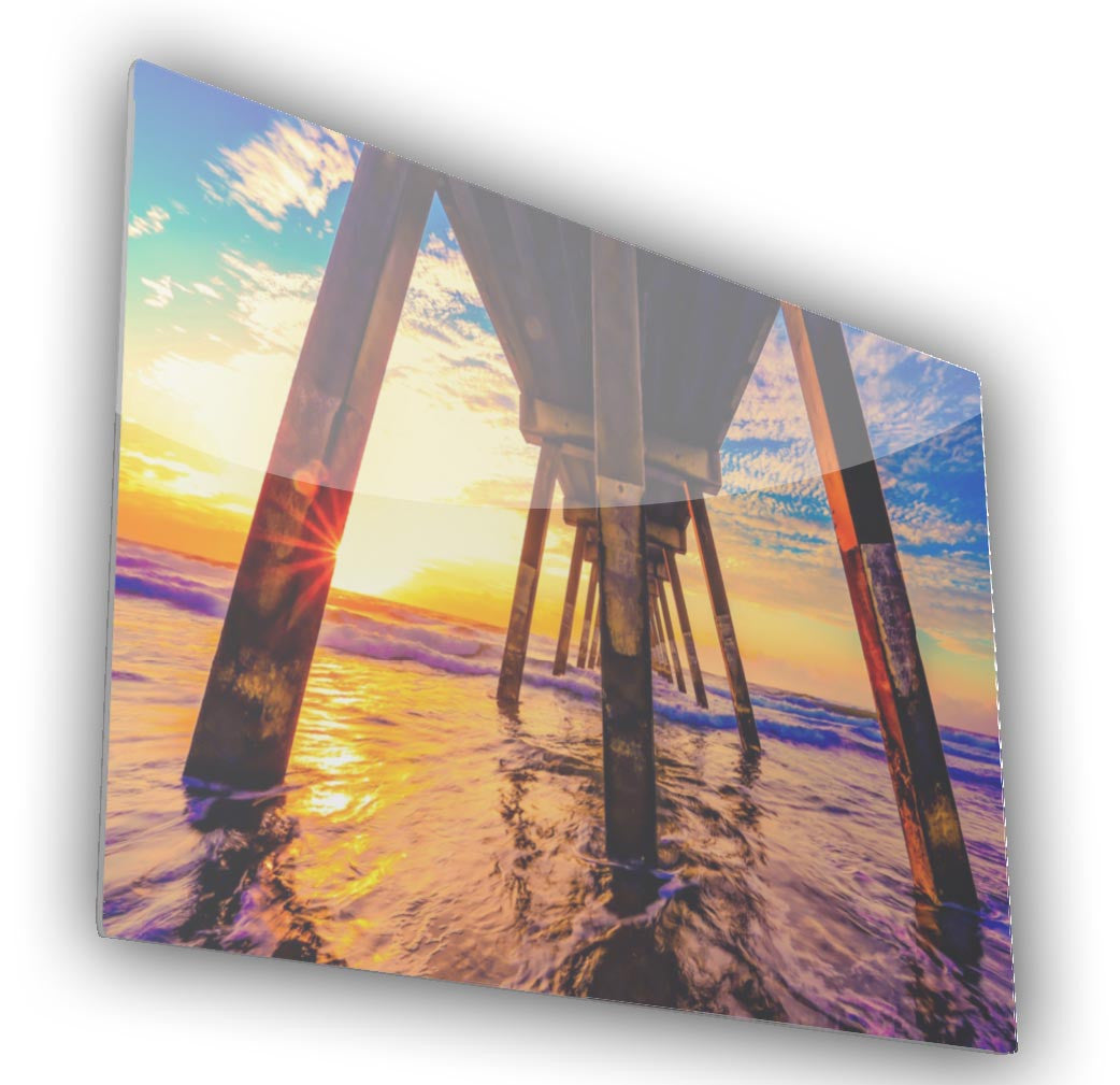 A metal print of a pier with a colorfull sunset. Metal Prints are stunning and produce a gallery quality display.  Enhance your print with a spotlight to produce an almost glowing appearance.